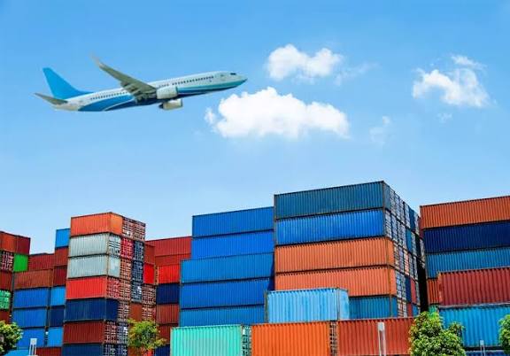 Port with shipping containers and aircraft